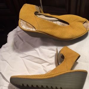 Perforated suede ankle wrap wedge